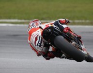 Marquez denies Rossi Sepang pole