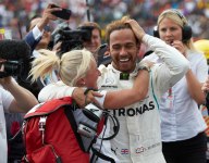 Hamilton says ‘special laps’ and ‘magical moments’ delivered title