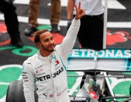 Hamilton ‘conflicted,’ humbled after matching Fangio