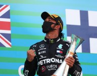 Hamilton humbled at beating Schumacher podium record